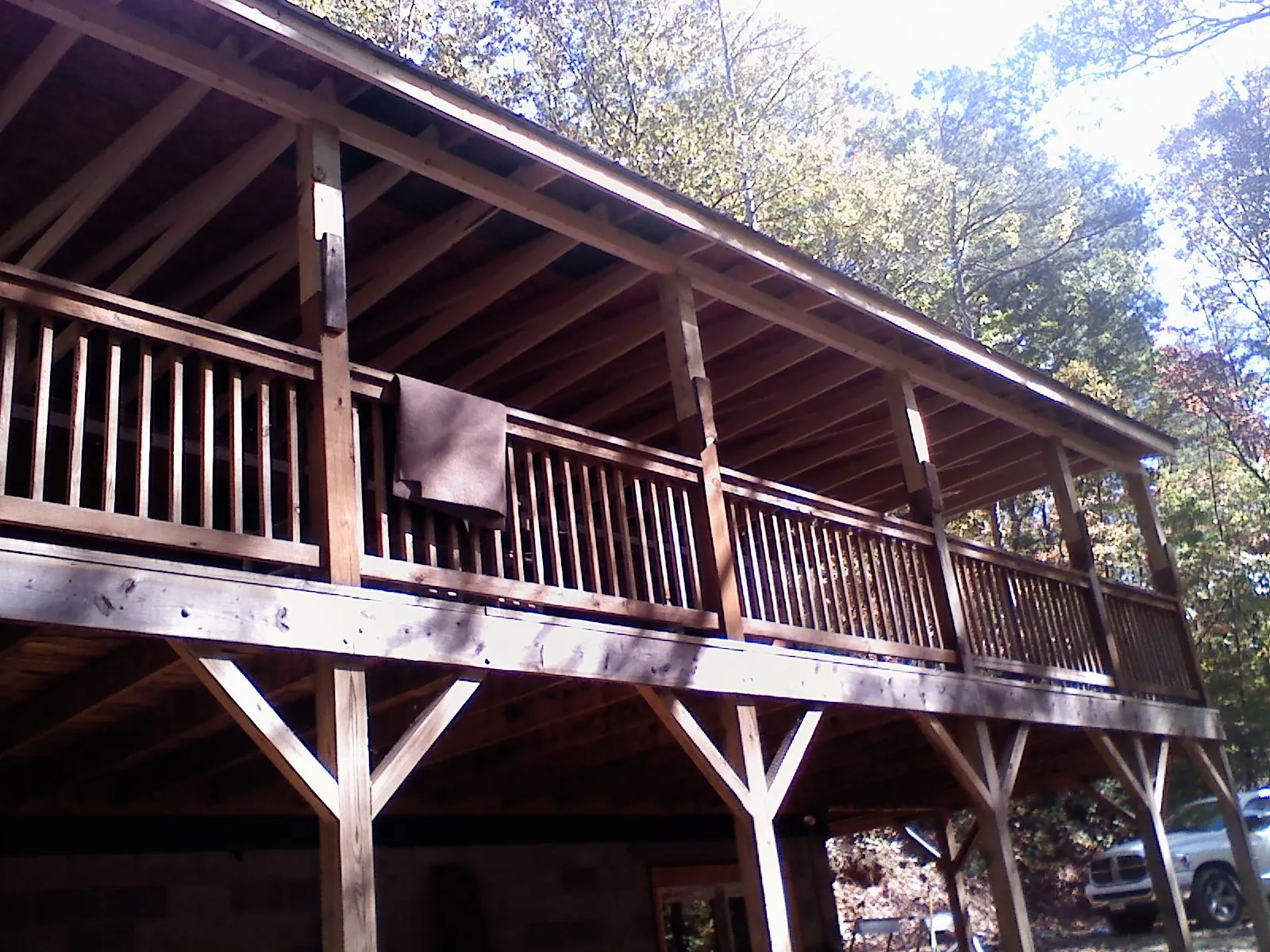 Timber framing under a new elevated porch and deck — Roof Leak Repair in Maple Falls by Roofing Brothers